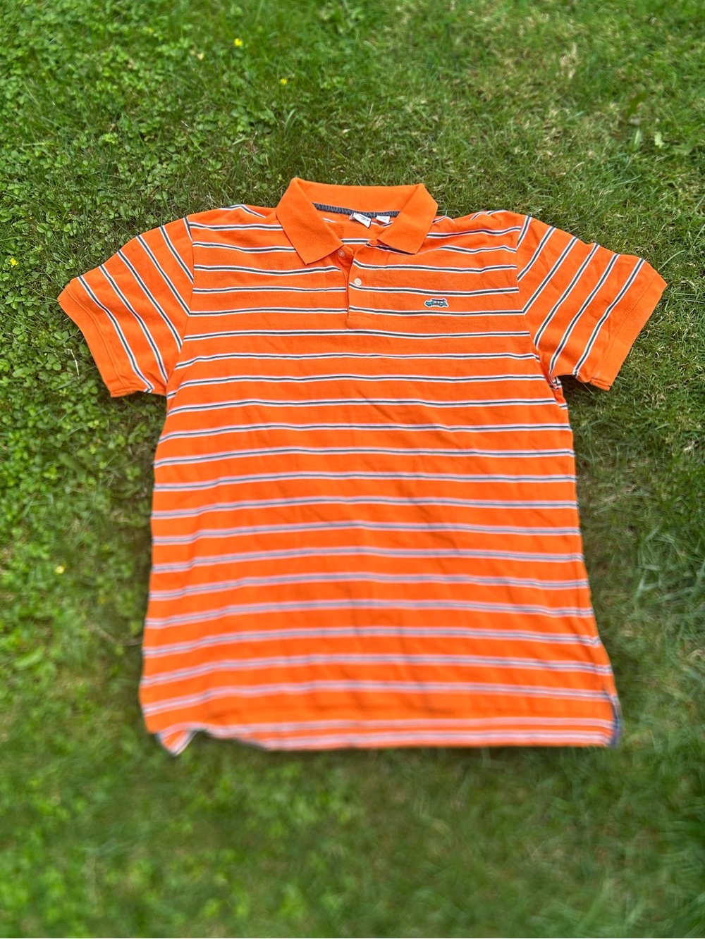orange striped Jimmy'z polo shirt